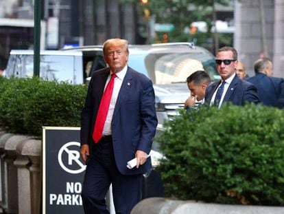 Former U.S. president Donald Trump walks outside as the trial of himself in a civil fraud case continues, in New York City, U.S., October 3, 2023.
