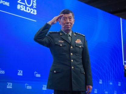 Chinese Defense Minister Li Shangfu salutes as he takes the podium to speak at the IISS Shangri-La Dialogue in Singapore June 4, 2023.