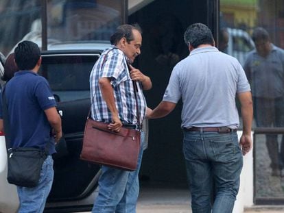 Bolivian authorities arresting the head of Lamia airlines.