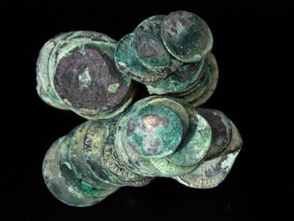 Silver coins that were found in the shipwreck of La Mercedes.