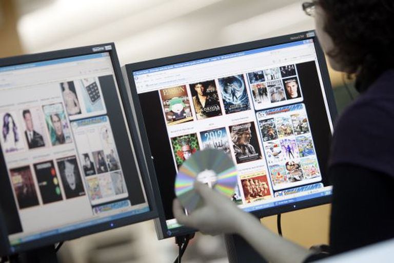 An internet user looks at webpages offering file downloads.