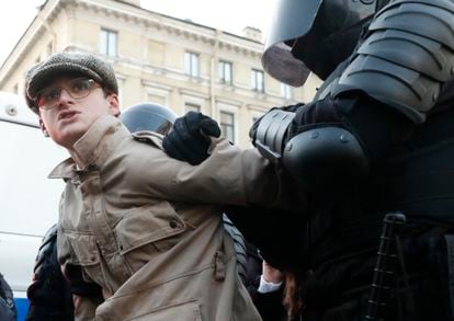 Police detain demonstrators at an unauthorized protest in St. Petersburg against Russia's partial military mobilization.