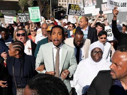 State Representative Justin Jones, D-Nashville, center, marches with supporters to the state Capitol, on April 10, 2023, in Nashville, Tennessee.