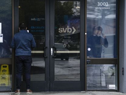A customer in front of a Silicon Valley Bank branch in Santa Clara, California.