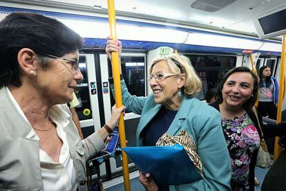 Madrid Mayor Manuela Carmena taking the metro to work.