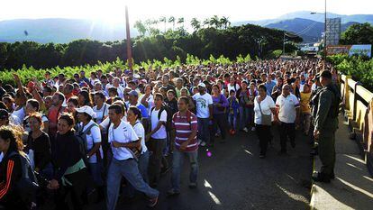 Hundreds of people crossed into Colombia from Venezuela on Sunday.