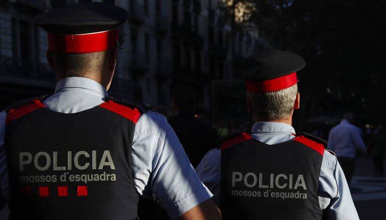 Two members of the Catalan police force.