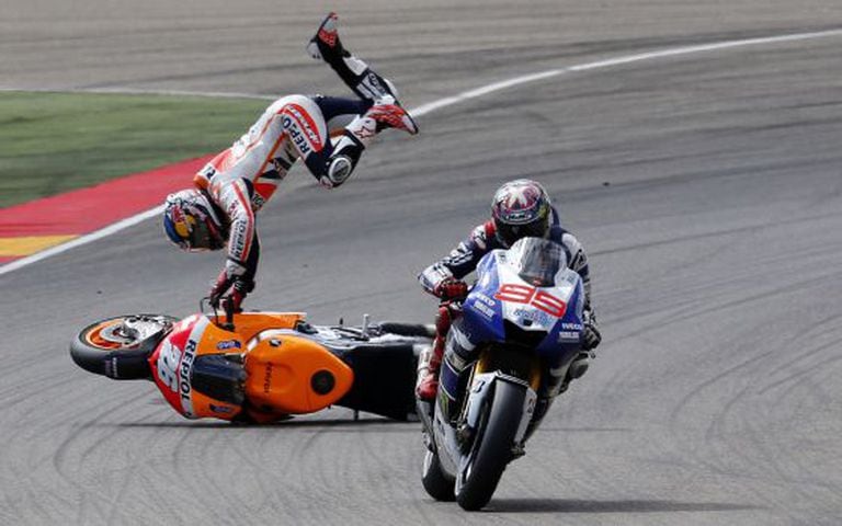 Honda's Dani Pedrosa suffers a highside behind Yamaha's Jorge Lorenzo during Aragón Grand Prix on Sunday.