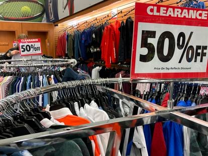 Clearance sale signs are displayed at a retail store in Downers Grove, Illinois, on April 26, 2023.