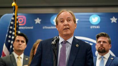 Texas state Attorney General Ken Paxton reads a statement at his office in Austin, Texas, Friday, May 26, 2023.