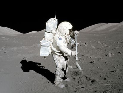 Astronaut Harrison Schmitt collects lunar samples, during the Apollo 17 mission, in December 1972.