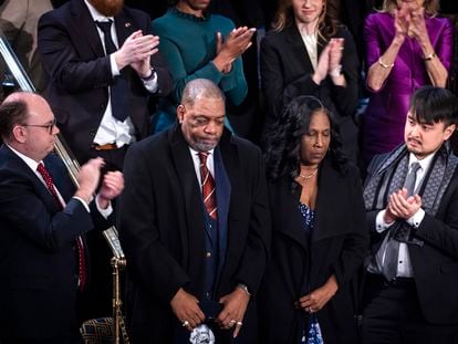 Row Vaughn (C-R) and Rodney Wells (C-L), mother and stepfather of Tyre Nichols, react as US President Joe Biden delivers his State of the Union address.