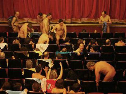 Archive image of spectators at a nudist play.