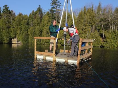 A team of geologists during sampling at Crawford Lake, Canada.