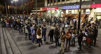 The price is right: The line snaking outside the Princesa cinema in downtown Madrid on Tuesday night. 