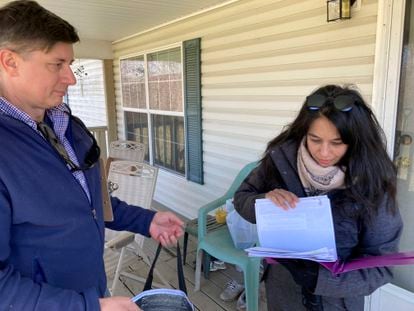 Ted Larson, left, of the US Agency for Toxic Substances and Disease Registry, and Vidisha Parasram of the National Institute for Occupational Safety and Health visiting a house, in Darlington Township, Pa. The community is across the state line from East Palestine, Ohio.