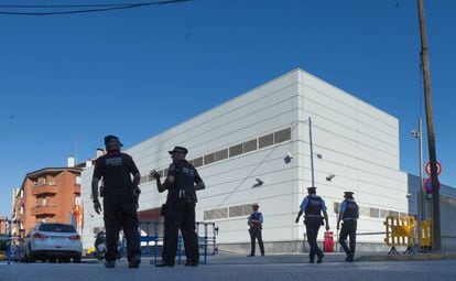 Officers outside the police station in Cornellà de Llobregat.
