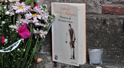 People leave books and flowers at García Márquez's home in Mexico City where he died on Thursday.