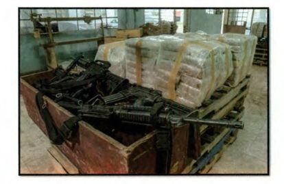 A weapons cache belonging to the Sinaloa Cartel, in a photo taken by an undercover DEA agent.