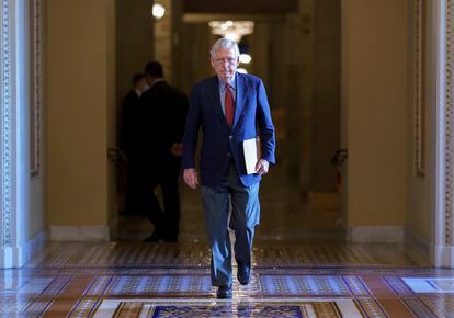 Senator Mitch McConnell walks to the chamber for a test vote on a government spending bill, at the Capitol in Washington, on September 27, 2021.