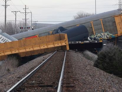 Multiple cars of a Norfolk Southern train lie toppled after derailing at a train crossing with Ohio 41 in Clark County, Ohio, on March 4, 2023.
