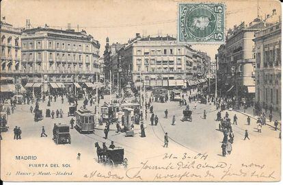 Trams pass through Puerta del Sol in this undated photo.