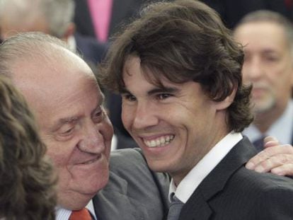 King Juan Carlos with tennis player Rafael Nadal.