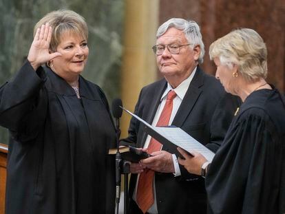 Janet Protasiewicz, left, is sworn as a Wisconsin Supreme Court justice, Tuesday, Aug. 1, 2023, in Madison, Wis.