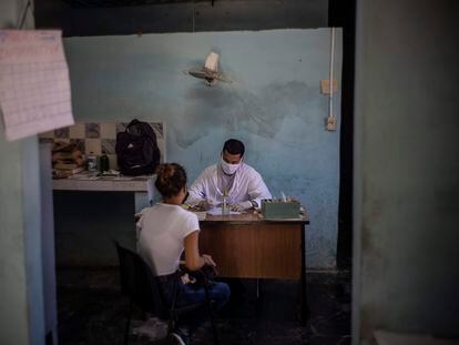 A doctor at the Boris Luis Santa Coloma sugar mill in Madruga, Cuba, in 2021.