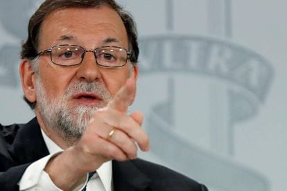 Spanish Prime Minister Mariano Rajoy speaks to reporters on Friday.