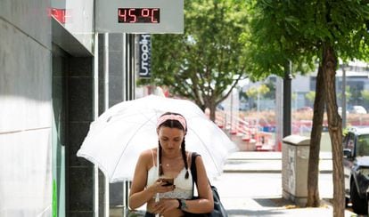 A woman walks in Lleida, which saw its highest temperature ever.