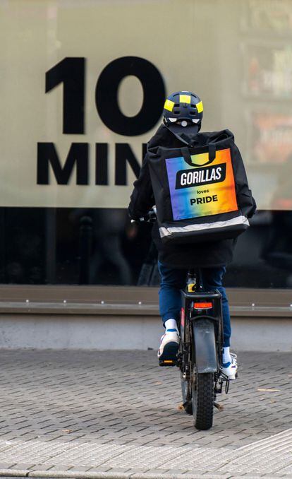 A courier from Gorillas, an ultra-fast grocery delivery app.