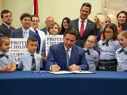 Florida Governor Ron DeSantis signs the Parental Rights in Education bill at Classical Preparatory school, on March 28, 2022, in Shady Hills, Florida.