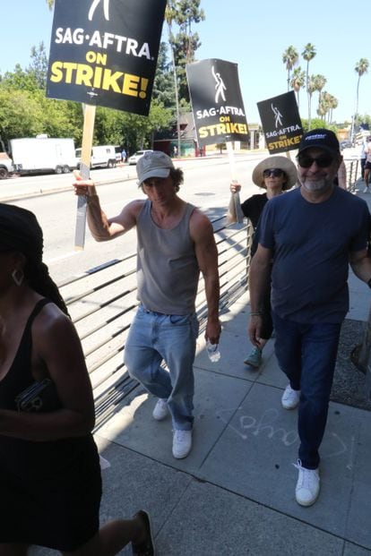 Jeremy Allen White walks a picket line in Los Angeles during the ongoing SAG-AFTRA strike; July 20, 2023.