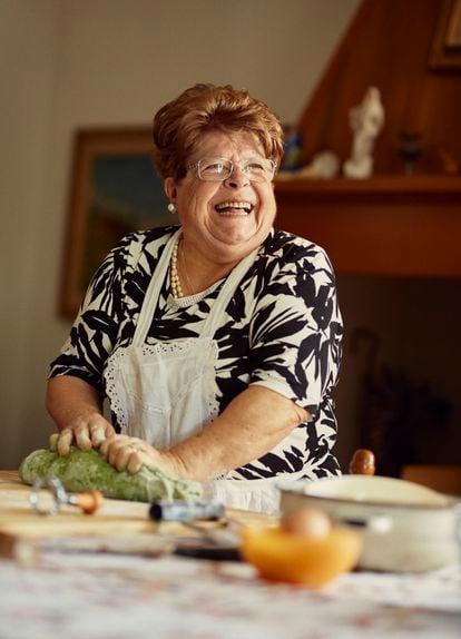 Leondina Micolucci prepares the dough for meat tortelli in her kitchen in Zattaglia, Italy.