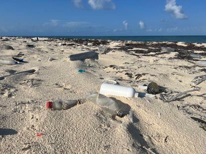 The pristine beaches of Tulum (Mexico) are spoiled by the trash left behind by tourists.