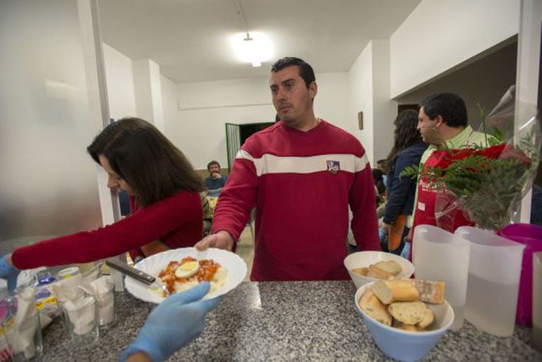 Antonio Luque, an unemployed electrician, stands in line at a soup kitchen in Jaén.