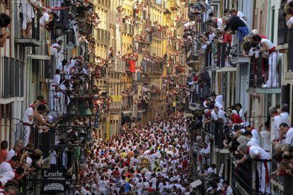 Estafeta street in Pamplona, packed with crowds, during the first Running of the Bulls in 2013.
