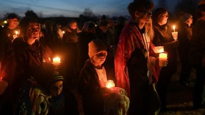 Members of the Brown family attend a vigil, after a shooting at Perry High School, in Perry, Iowa, U.S., January 4, 2024.