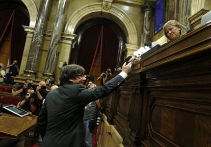 Catalan premier Carles Puigdemont casts his ballot on Friday.