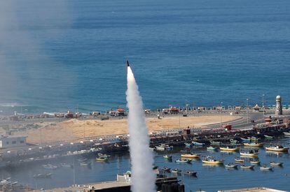 A Palestinian rocket launched from Gaza streaks toward Israel.