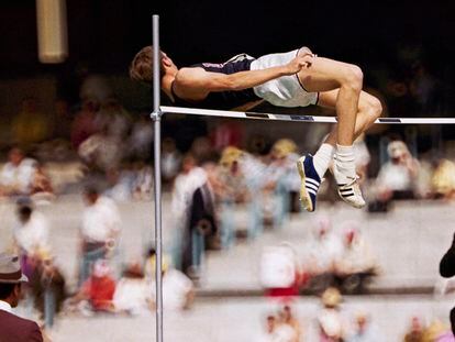 Dick Fosbury, of the United States, clears the bar in the high jump competition at the 1968 Mexico City Olympics.