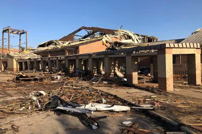 Wynne High school is damaged from Friday's severe weather in Wynne, Ark., on Saturday, April 1, 2023.  Unrelenting tornadoes that tore through parts of the South and Midwest that shredded homes and shopping centers. (AP Photo/Adrian Sainz)
