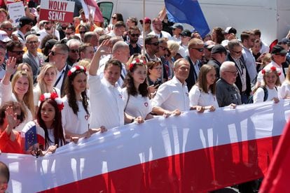 Mayor of Warsaw Rafal Trzaskowski, Donald Tusk, leader of main opposition party Civic Platform (PO), and former Polish President and Peace Nobel Prize laureate Lech Walesa take part in the march on the 34th anniversary of the first democratic elections in postwar Poland, in Warsaw, Poland, June 4, 2023.