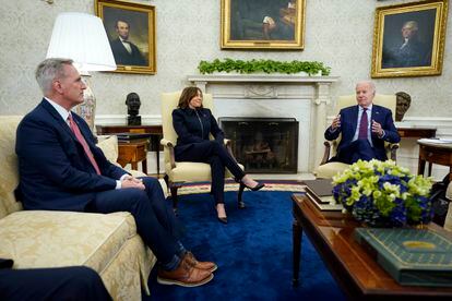 Speaker of the House Kevin McCarthy and Vice President Kamala Harris listen as President Joe Biden speaks during a meeting in the Oval Office of the White House, on May 16, 2023, in Washington.