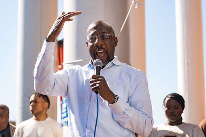 Raphael Warnock speaks at a campaign event at Atlanta University Center Consortium Campus as voters in Georgia take to the polls to cast their ballot on November 8, 2022. 