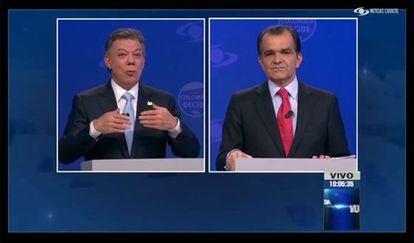 Santos (left) and Zuluaga during the televised debate.