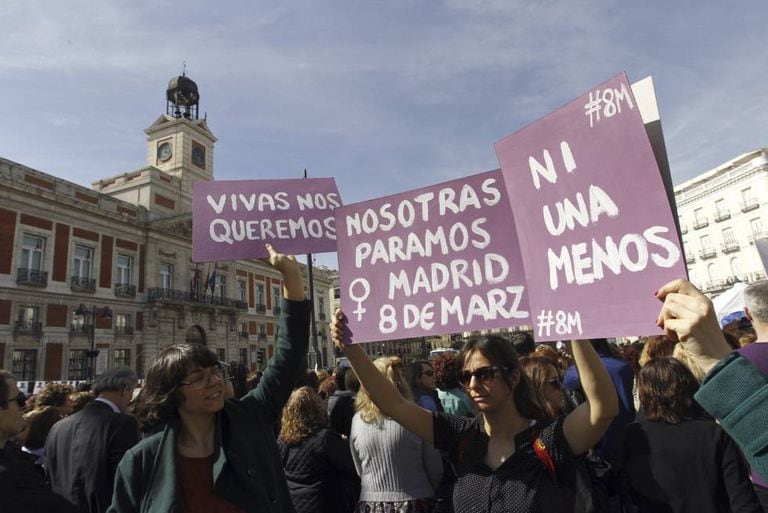 Women gather in central Madrid on Wednesday.