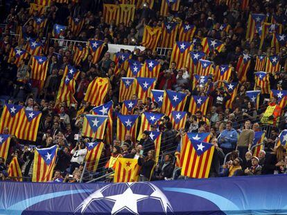 Barça fans holding esteladas at the Copa del Rey final.