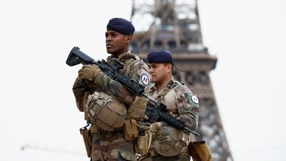 Soldiers on patrol at the Trocadero in Paris on March 25.